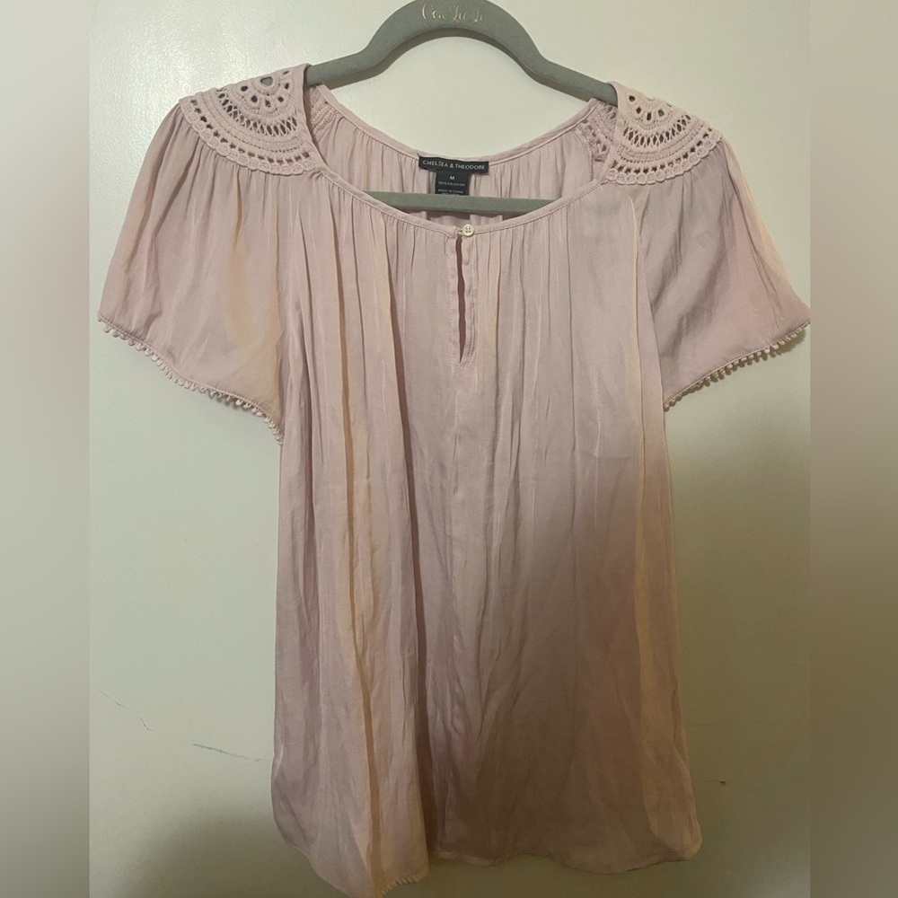 Chelsea and Theodore size M eyelet sleeve top.